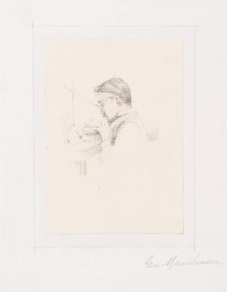 Man Working on Wood Block