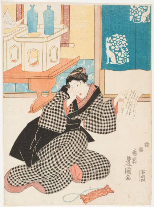 Actor as a Woman Holding a Written Sheet of Paper