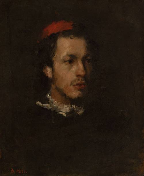 Young Man with Red Skull Cap