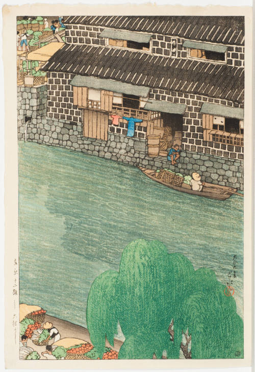 Brown Building along a Water-Way