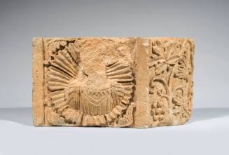 Relief with Defaced bust of an Astrological Sign and Grapevine Motif