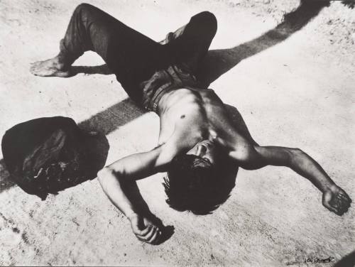 Boy in Blue Jeans Lying on Back