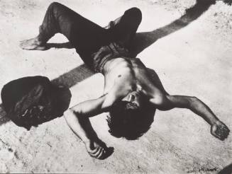 Boy in Blue Jeans Lying on Back