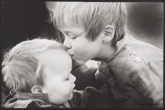 Two Children Kiss