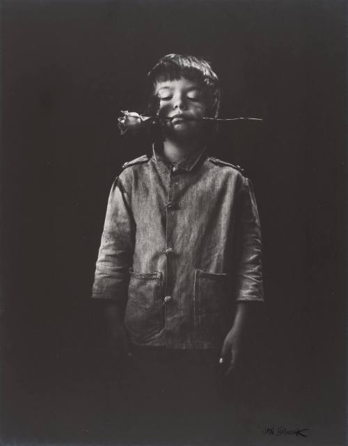 Boy with Rose