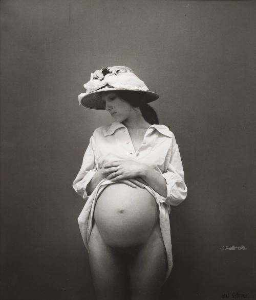 Pregnant Woman in Flowered Hat