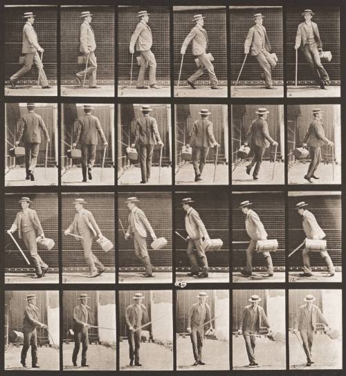 Walking and Turning around Rapidly with a Satchel in One Hand, a Cane the other