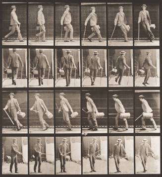 Walking and Turning around Rapidly with a Satchel in One Hand, a Cane the other