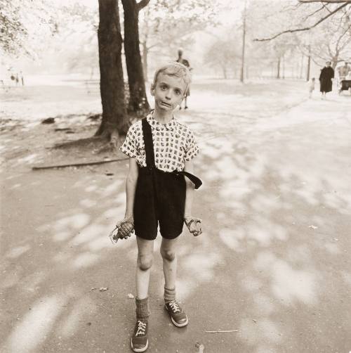 Child with a Toy Hand Grenade