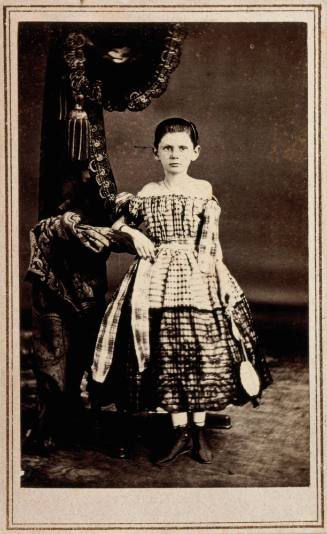 Portrait of a Young Girl in Plaid Dress