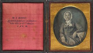 Woman Holding Daguerreotype