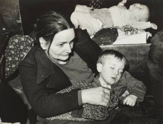 Farm Woman and Son at Pie Supper in Muskogee County, Oklahoma