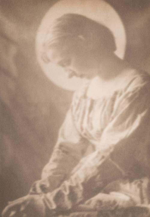 Seated Woman, Head Bowed With Halo