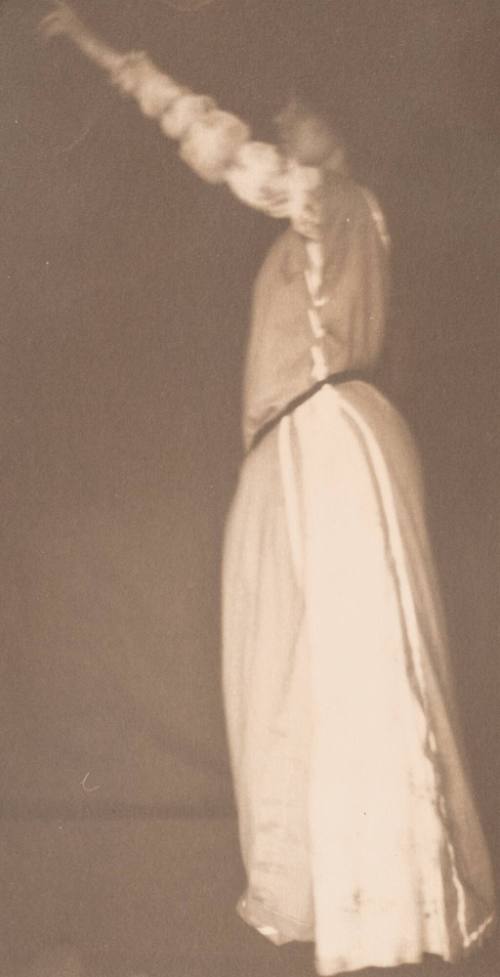 Standing Woman Facing Left With Left Arm Upraised