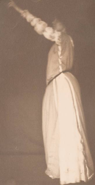 Standing Woman Facing Left With Left Arm Upraised