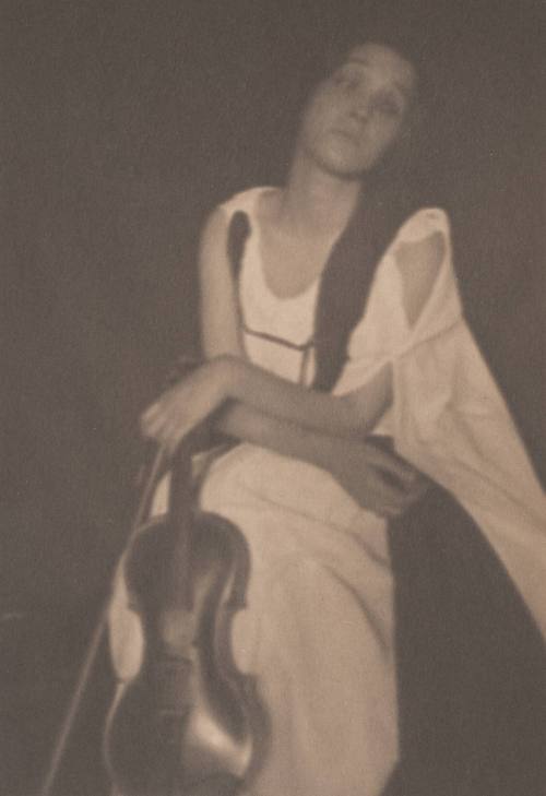 Seated Woman With Arms Crossed, Holding a Violin