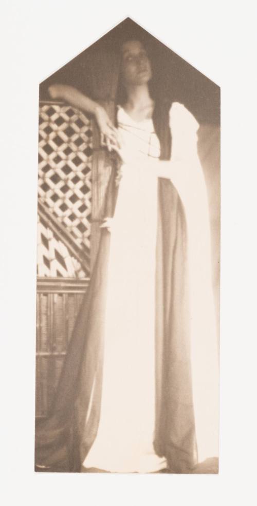 Standing Woman in Medieval Costume, Right Arm Resting on Lattice Work