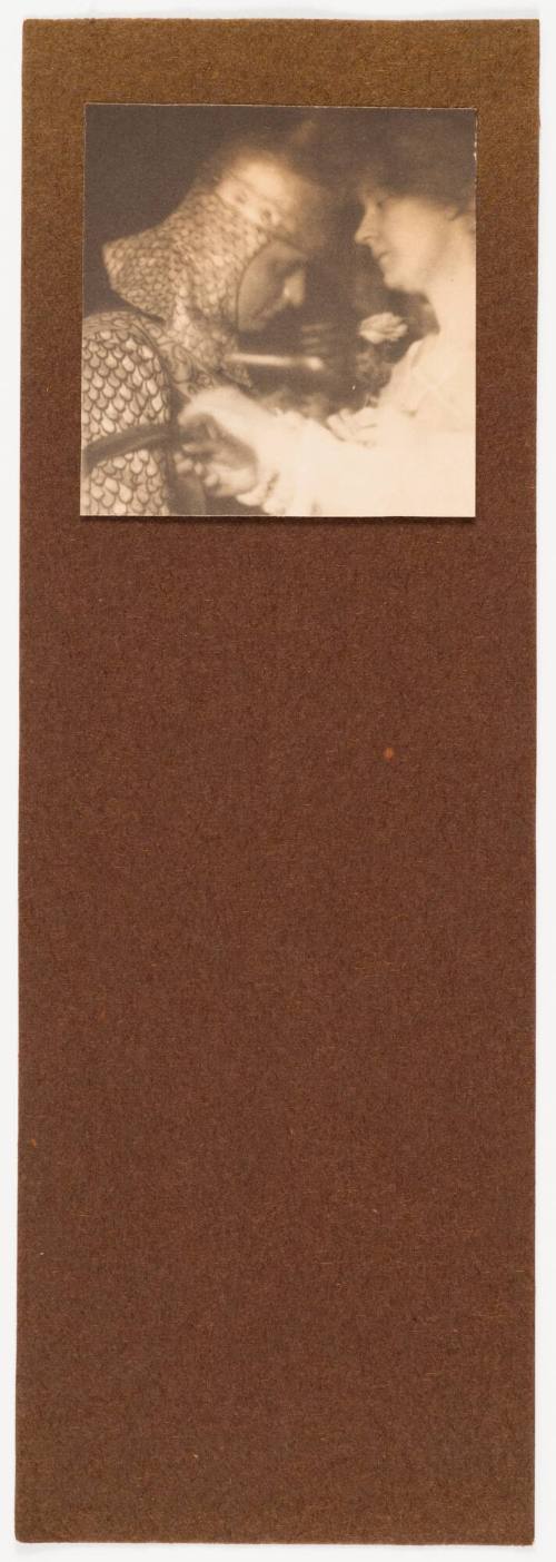 Woman With Rose and Man in Knight Costume