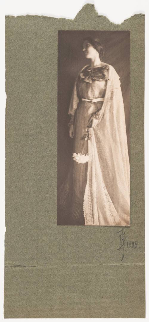 Standing Woman With Lace Shawl Holding Flower