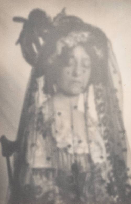 Woman Wearing Veiled Hat