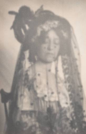 Woman Wearing Veiled Hat