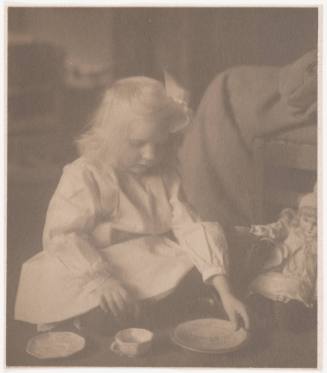 Girl Playing With Doll and China