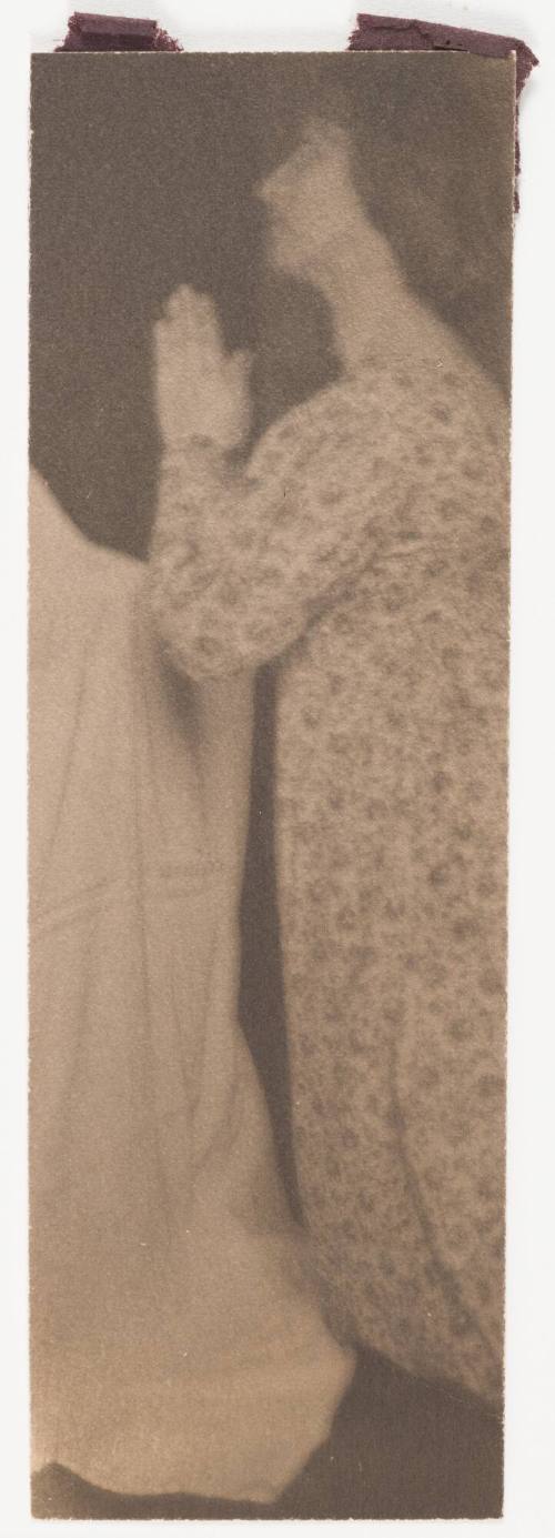 Woman in Flowered Dress Praying