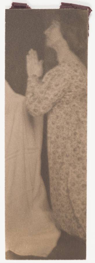 Woman in Flowered Dress Praying