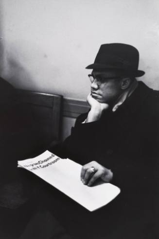 Untitled (Malcolm X with Newspaper)