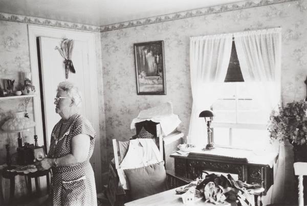 (Interior of a House with Unidentified Woman, Maine) by Walker Evans