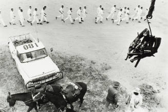 Guns are Passed to the Picket Tower; The Line Returns from Work