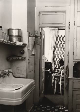 Untitled (Kitchen Interior with Seated Woman, Harlem)