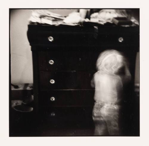 Child and Chest of Drawers