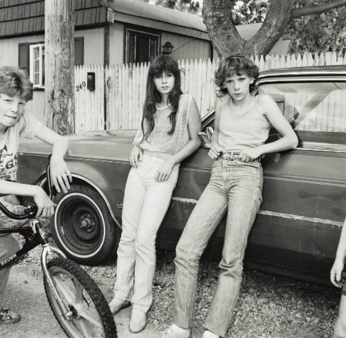 Two Girls with Big Wheels