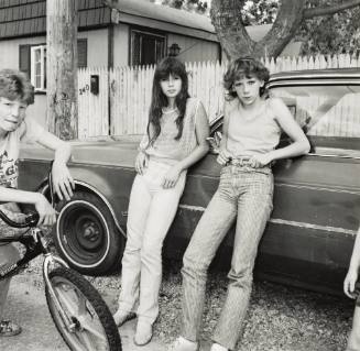 Two Girls with Big Wheels
