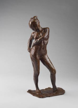 Dancer Fastening the String of her Tights